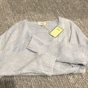 Cross-over blue knit sweater